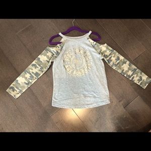 An adorable cold shoulder shirt for young girls.